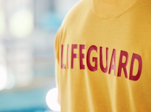 Lifeguard, Closeup And Swimming Pool Safety At Indoor Facility For Training, Swim And Exercise. Poo