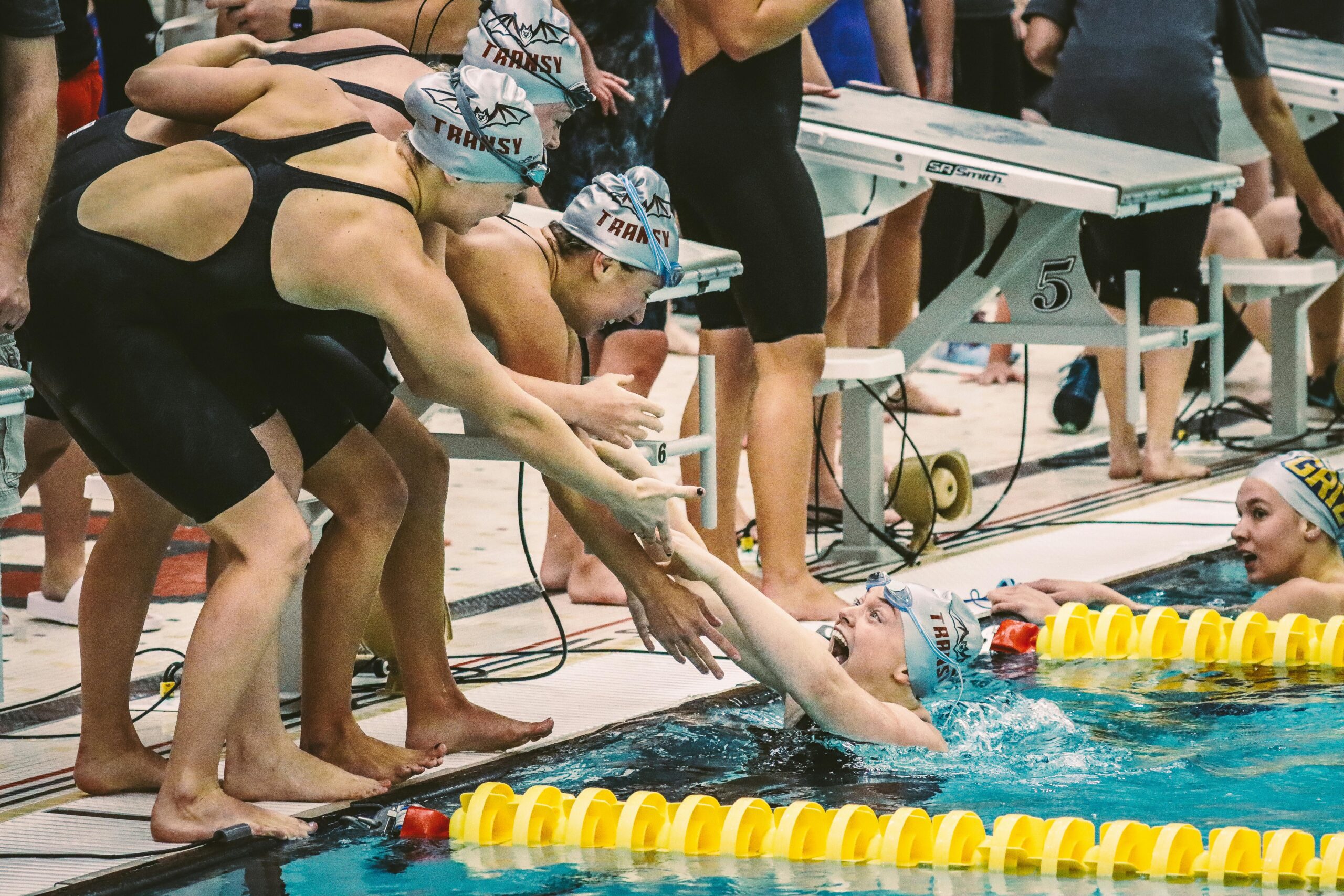 swimming competetion race winner swimming competetion race winner scaled